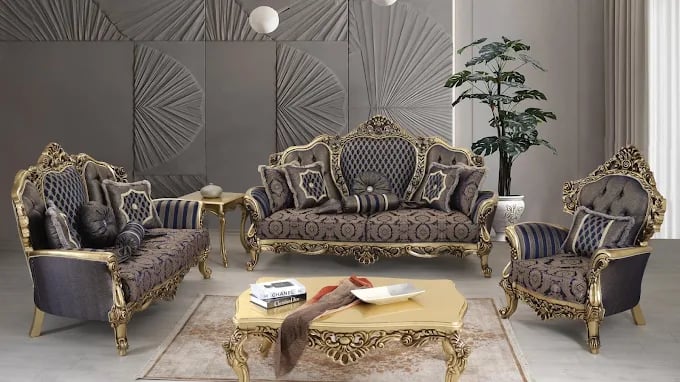Luxurious baroque-style living room with ornate gold and gray furniture
